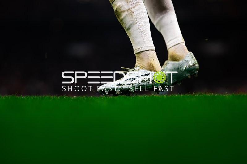 Fußballschuhe auf Rasen