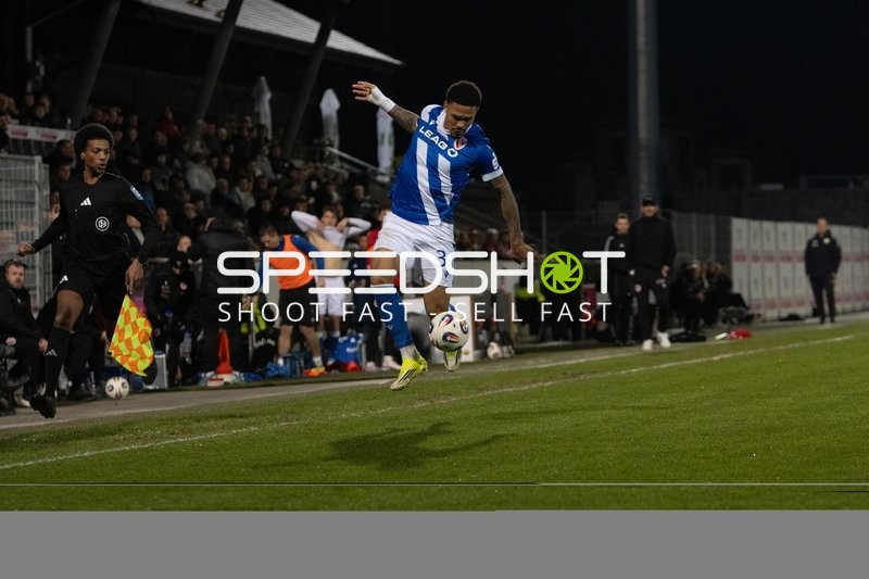 Spieler mit Ball in Aktion