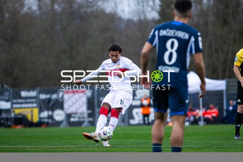 Spieler mit Ball und Verteidiger