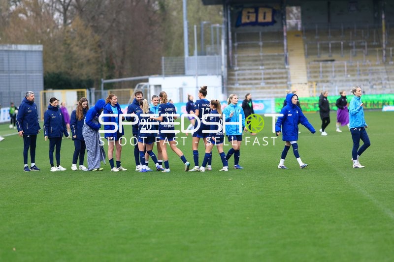 Spielerinnen und Betreuer