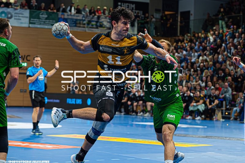 Szene mit Arseniy Buschmann (11; HC Elbflorenz Dresden) und Frederic Stuber (2; Die Eulen Ludwigshafen)