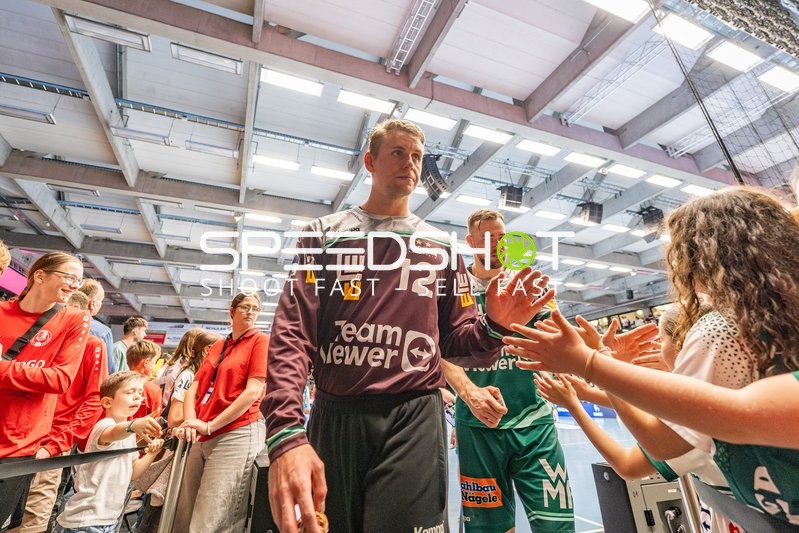 Kristian Saeveras #12 (Göppingen), Ludvig Jurmala #25 (Göppingen