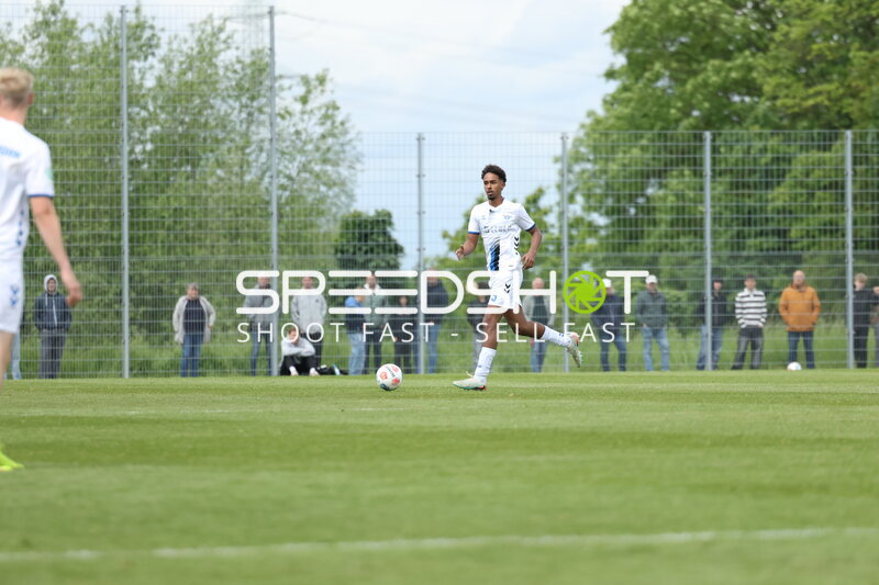 Spieler mit Ball in Aktion