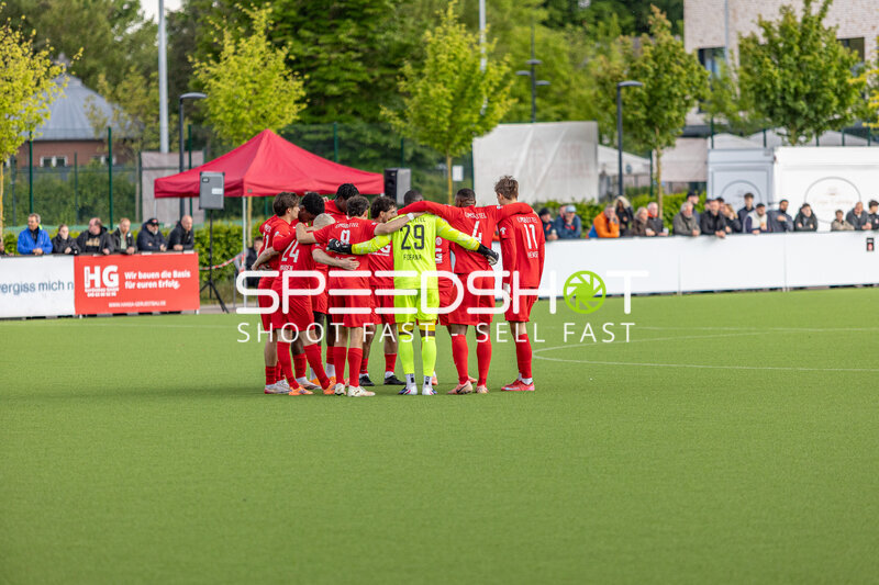 Mannschaft im Teamkreis