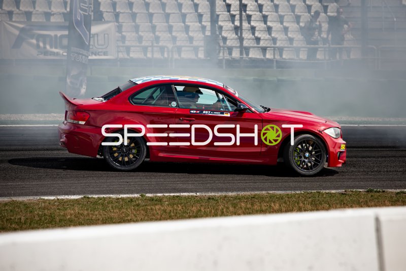 BMW 1er M Coupé #957 driftet durch Rauch am Hockenheimring