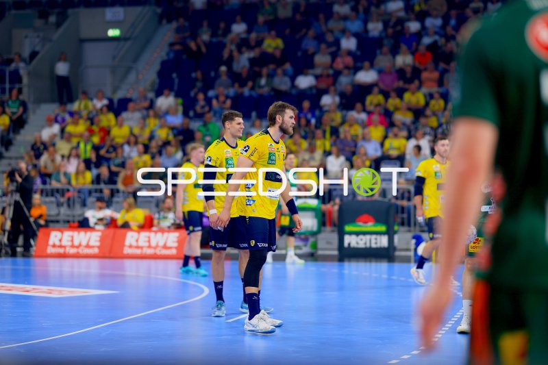 Sebastian Heymann (#13; Rhein Neckar Löwen) und Steven Plucnar Jacobsen (#9; Rhein Neckar Löwen) im Spielgeschehen