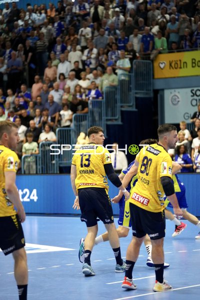 Sebastian Heymann (#13) und Jannik Kohlbacher (#80; Rhein Neckar Löwen) im Spielgeschehen